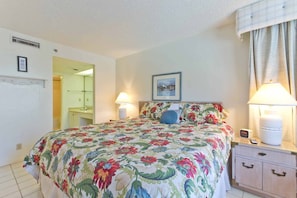 The Primary bedroom has a king-size bed.
