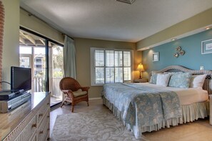 Bedroom 1 features a king bed and access to the porch.