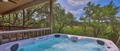 Hot tub with views overlooking hill country