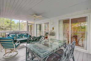 Screened porch for outdoor living.