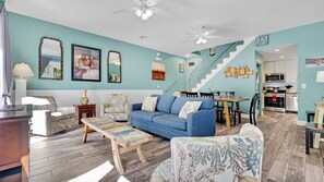 The plush living room sofa pulls out to a Queen sleeper to accommodate two extra guests...