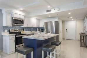 Our modern dining space is nestled in the kitchen area. Entertaining here is a breeze.