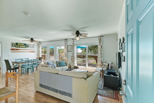 Entryway view of Living Room and Dining Area