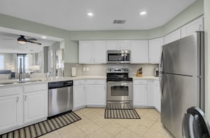 Large and beautiful kitchen w/ stainless appliances.