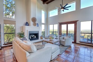 Formal living area with decorative fireplace