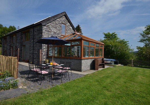 View of patio area and hot tub