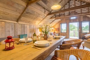 Snow Hall Barn, Peasenhall: The open-plan living area has french doors that open on to a decked balcony