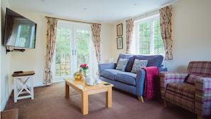 Living room, Emma Dent Cottage at Sudeley Castle, Bolthole Retreats