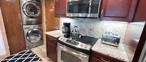 Full size washer dryer in the entryway.