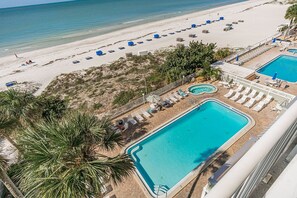 View from balcony of pool deck and beach