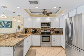 Full size kitchen with stainless