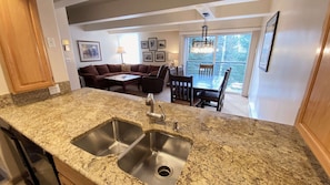 Kitchen with granite counter tops.