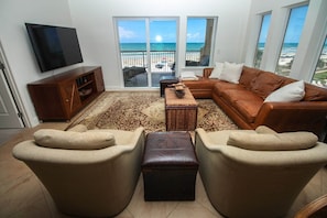 The Living Room with a Sectional & Two Accent Chairs