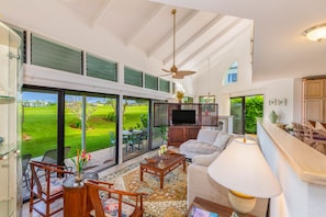 Spacious living room, with views of golf course and ocean