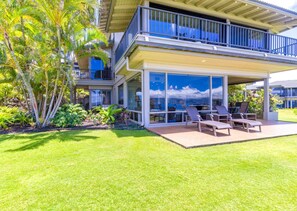 Step out to your private lanai, surrounded by tropical gardens, ocean views, and island serenity KBV-14G4