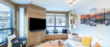 Living room with a sofa and a flat-screen TV