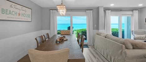 Sand Cliffs 118 Dining Table and Living Area with Gulf View