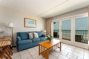 Our homey island getaway has a 5-star beachfront view from our living room and kitchen.