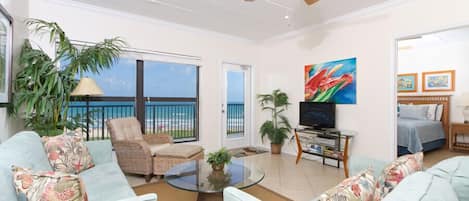 Our bright living area is family-friendly and comes with a wonderful view of the beach.