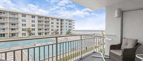 View of Pools and Beach from Balcony