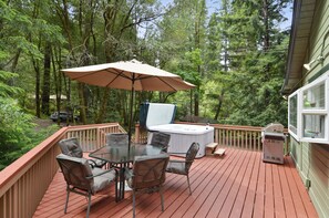 A large deck for dining, BBQ-ing, and hot tub-ing!