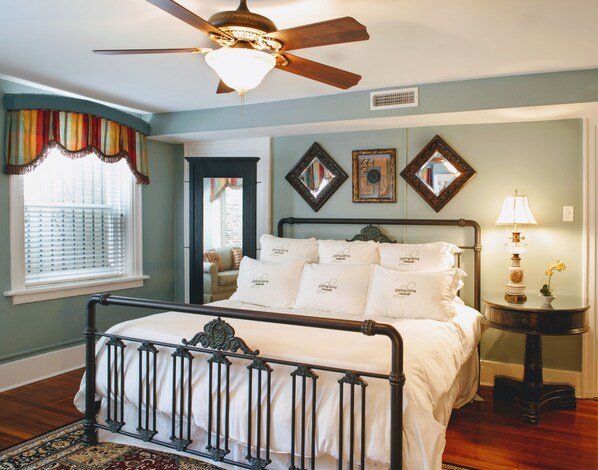King bed in the 1st of 2 bedrooms with luxury linens and 2 full bathrooms.