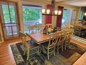 Dining area with deck beyond