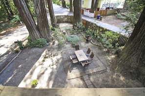 Outdoor dining for six and room for the kids and dogs to play in the fully fenced yard.