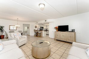 The living space is open and airy with soft wood accents that gives off ultra calming vibes!