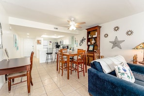 Our sunny living room reaches into the dining space - the perfect backdrop for movie and pizza night!