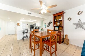 Our dining table and breakfast bar will make meal times as fun as a walk on the beach.