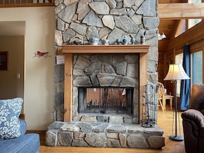 Living Room with Two Sided Wood Fireplace