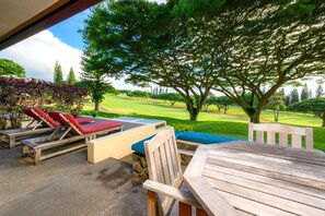 Breathe deep, sit back, and let the shade of century trees and golf course calm wrap you in island stillness     KGV-14P6