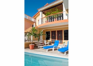 Front door opens onto the pool