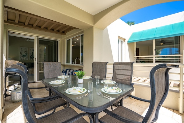 Enjoy outside dinning on the private lanai. 