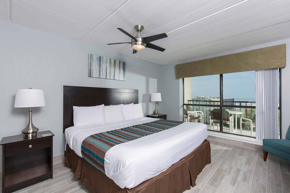 The lovely master bedroom has a king-size bed and a beautiful view!