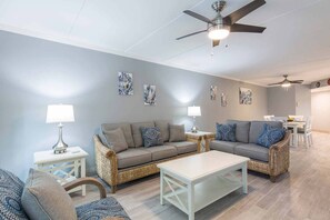 The spacious living area has plenty of seating for everyone!