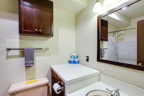 Full bathroom with shower and tub