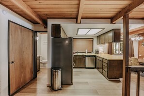 View of kitchen and downstairs bathroom