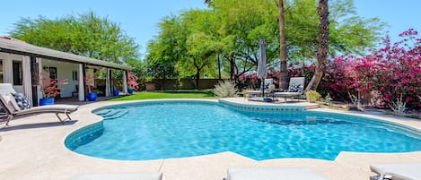 Enjoy the beautiful pebble-tec pool with 8 chaise lounges surrounding-