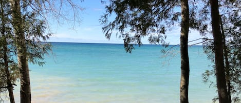 Just steps from beautiful Lake Michigan to a private white sand beach!