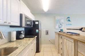 Granite Countertop Kitchenette with Built-in Convection Oven, Equipped for Complete Meal Preparation