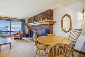 The dining table seats up to 4 people.