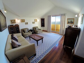 Comfortable living room decorated with genuine classic style furniture.