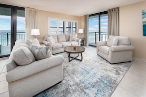 Living room with sofabed couch and balcony access