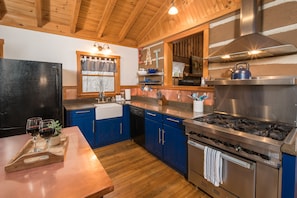 Enjoy the 6-burner stove in this spacious kitchen