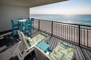 Balcony seating/dining and view with chaise