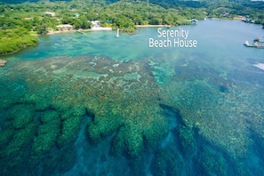 Aerial View of our coral reef and the beach in front of our house