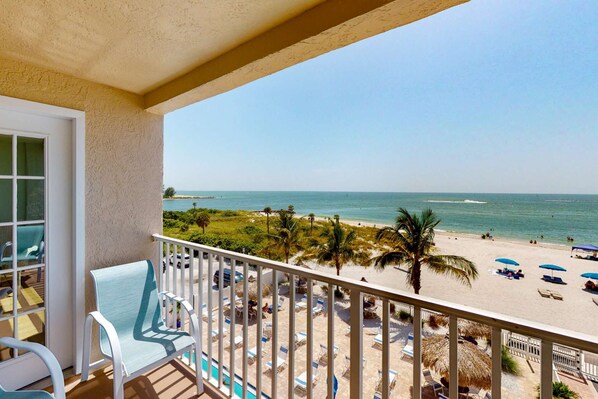 Look out to Johns Pass from your private balcony.