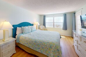 Master bedroom is furnished with a comfortable King size bed and leads out to the private balcony area.